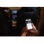 maxicosi_connectedhome_see_lifestyle_car_momcheckingbabymonitorviaappincar.jpg