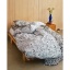 MoominArabia_2023_textiles_moominpappa_liljablackandwhite_bedsheetst1.jpg